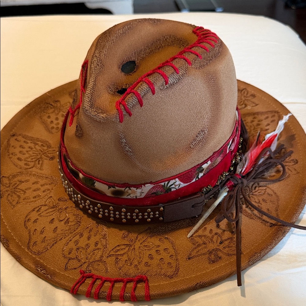 Brown and Red Stitched Hat with Feather Detail